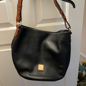 Dooney & Bourke pebble grain small hobo shoulder bag in black with tan strap
